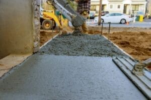 construction-worker-pouring-reinforced-concrete